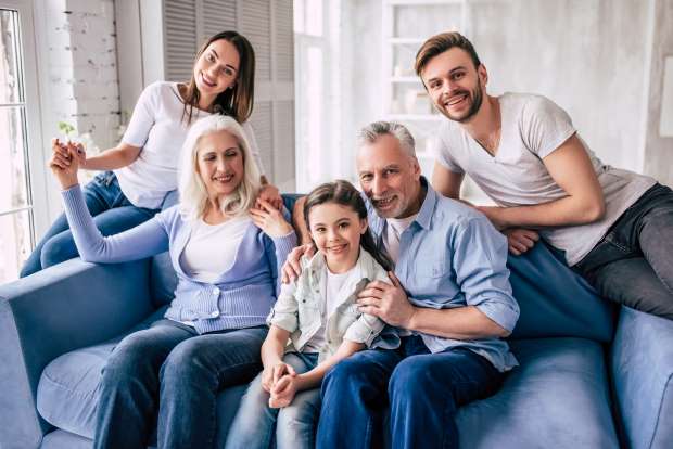 big happy family sitting on the sofa