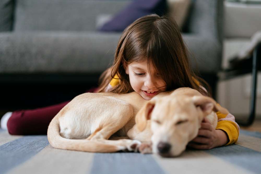 kid with a puppy