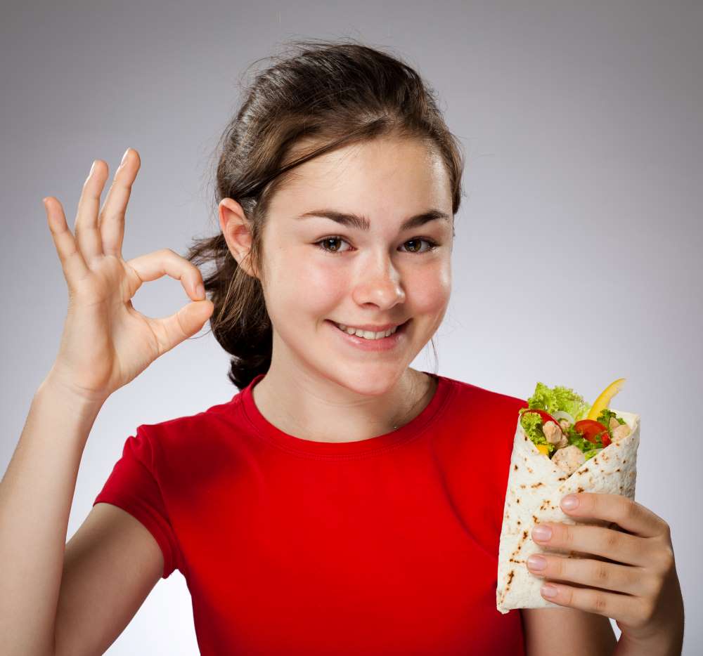 kid eating healthy proteins