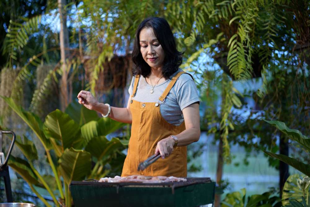 mom cooking bbq grill