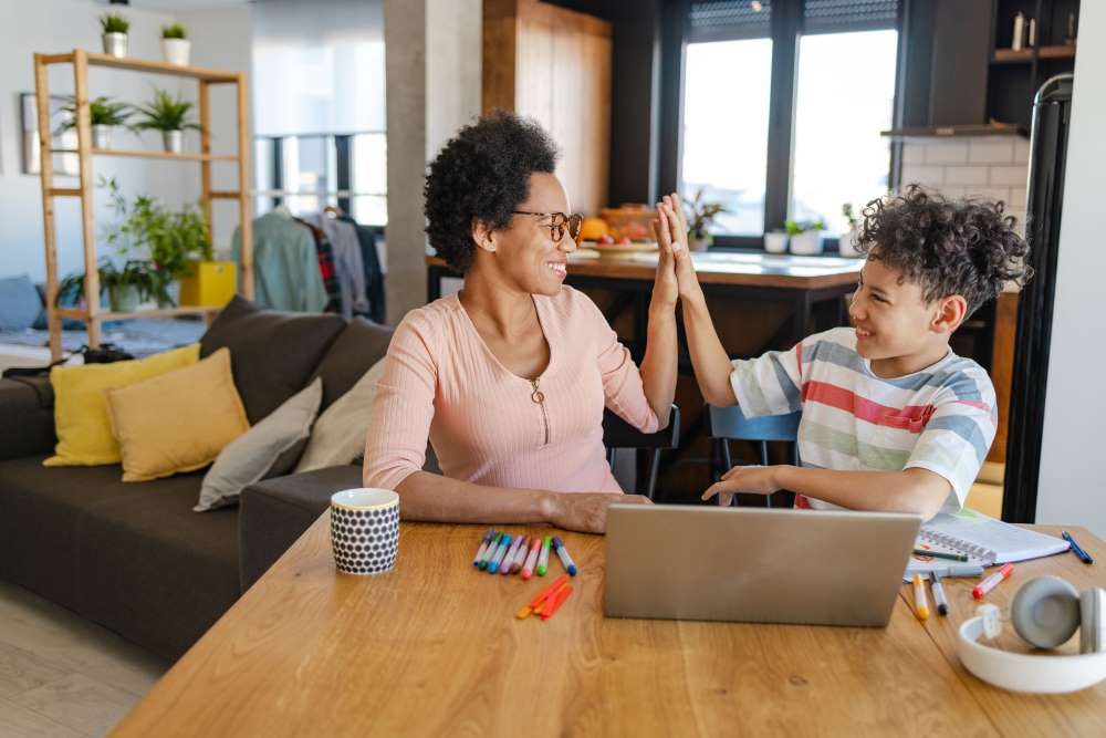 mom helping her son with homework