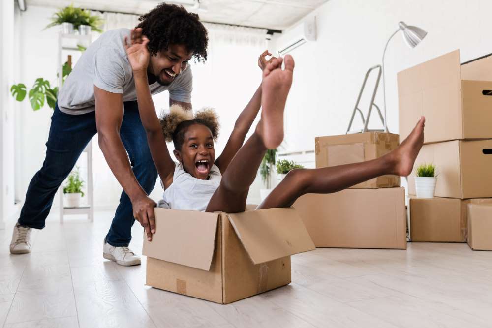 father and daughter moving and having fun