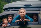 kids in car on a roadtrip 