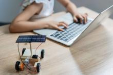 kid playing on a computer